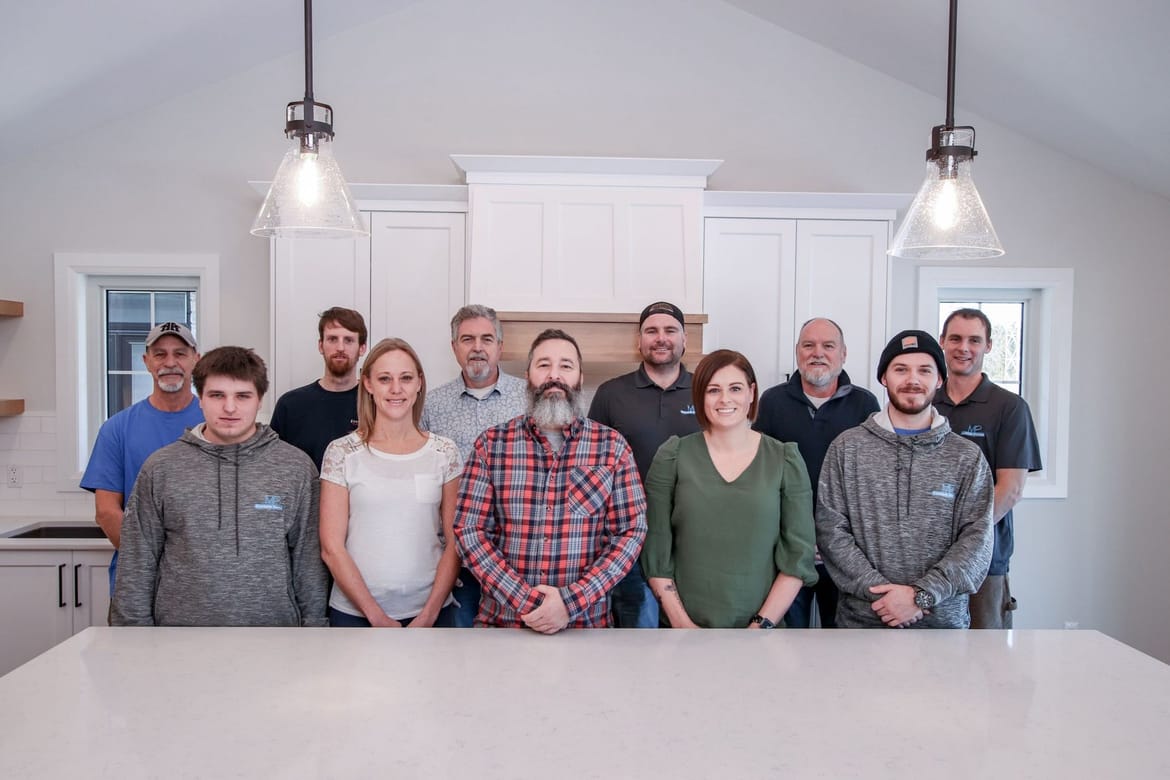 The MP Custom Homes team in a finished kitchen